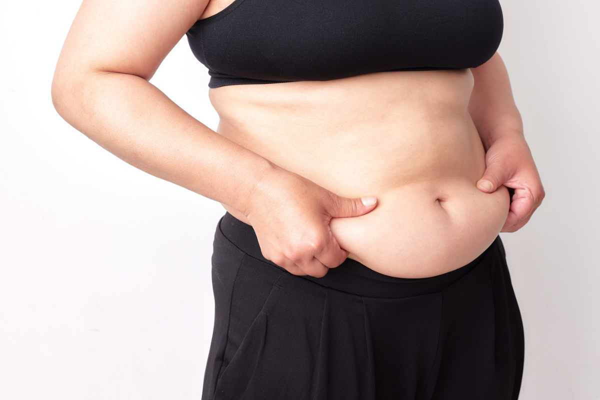 menopause belly, a stomach showing excess visceral fat 