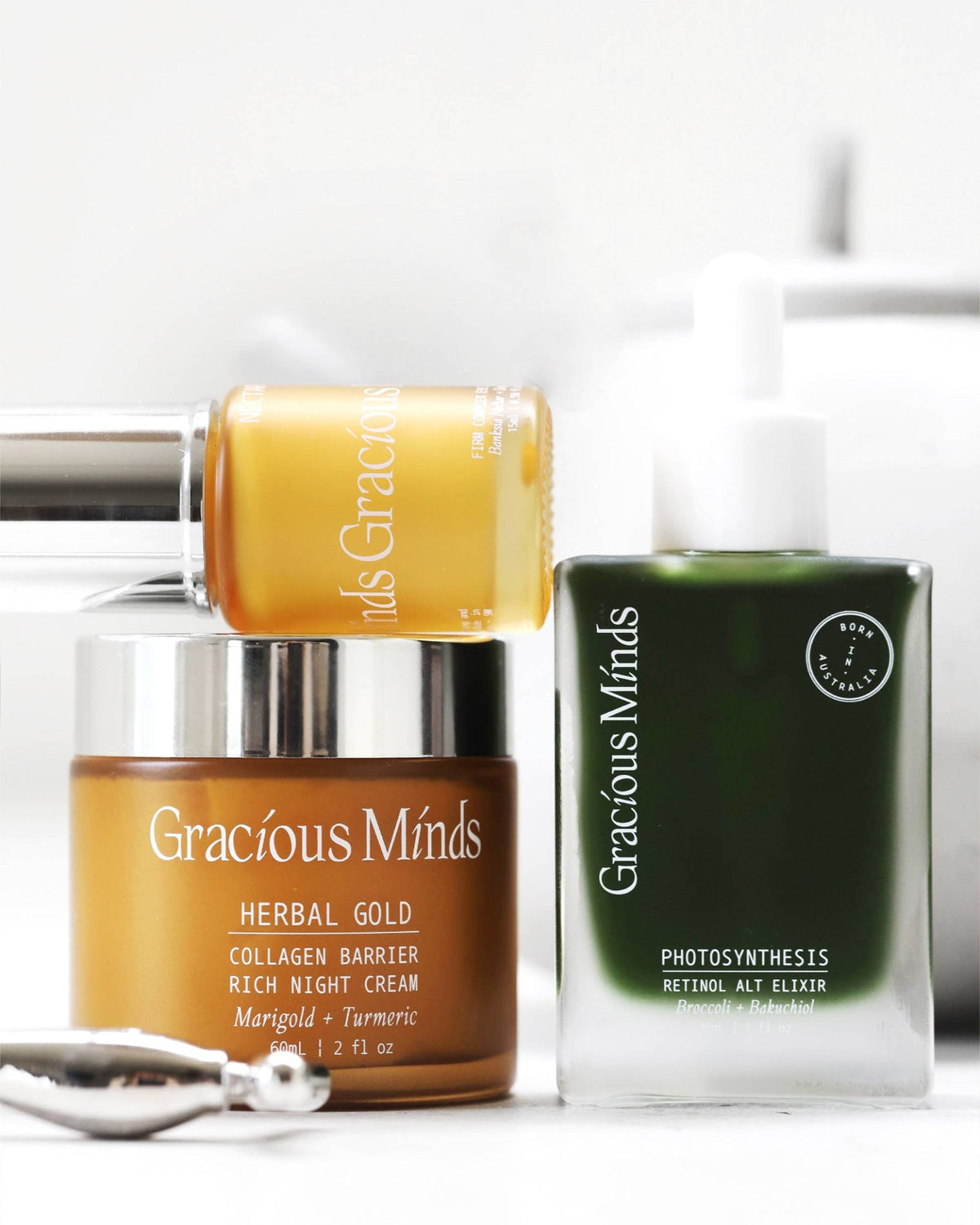 Three skincare products from Gracious Minds on a white background